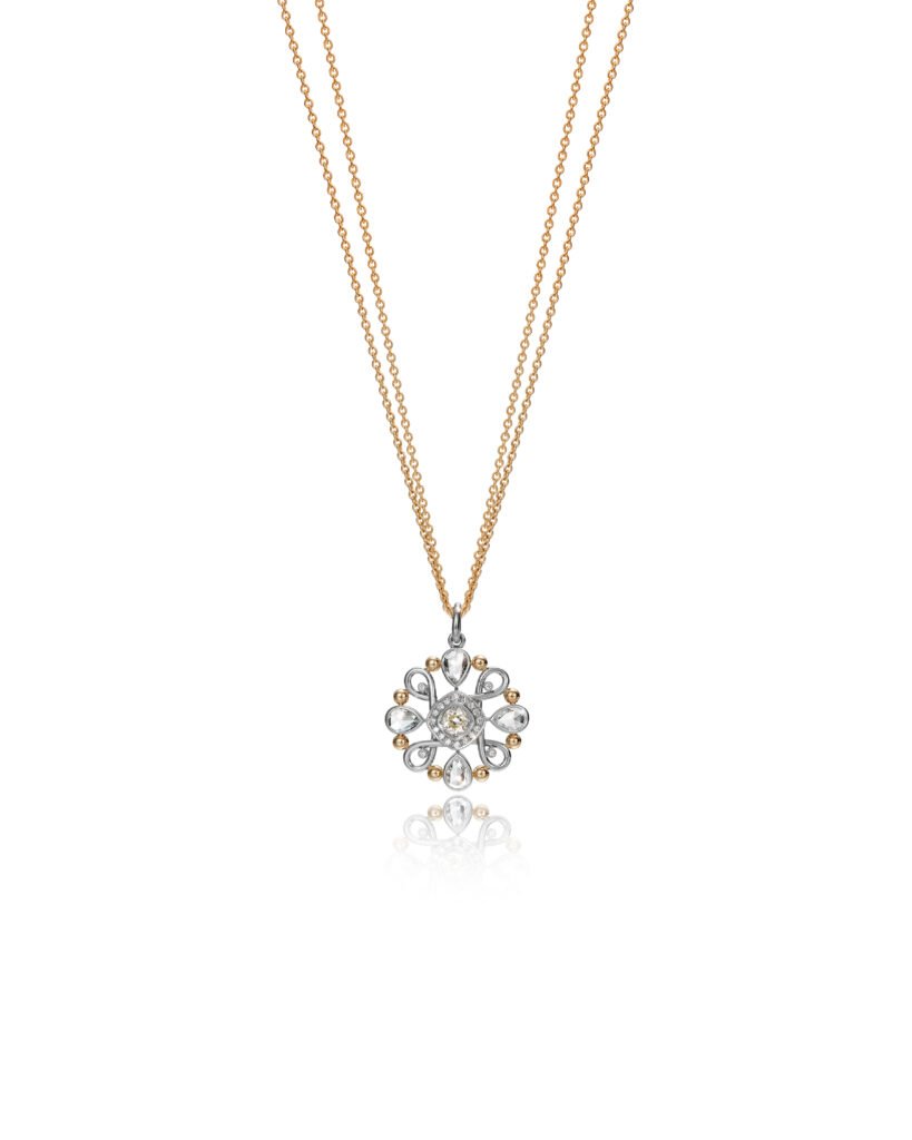 ornamented flower pendant with diamonds in yellow gold and in white gold