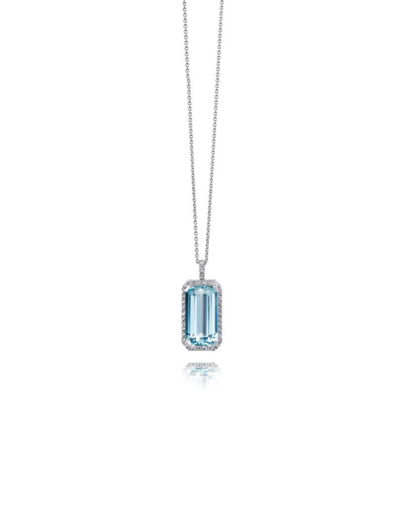 emerald cut aqauamarine pendant with diamond halo