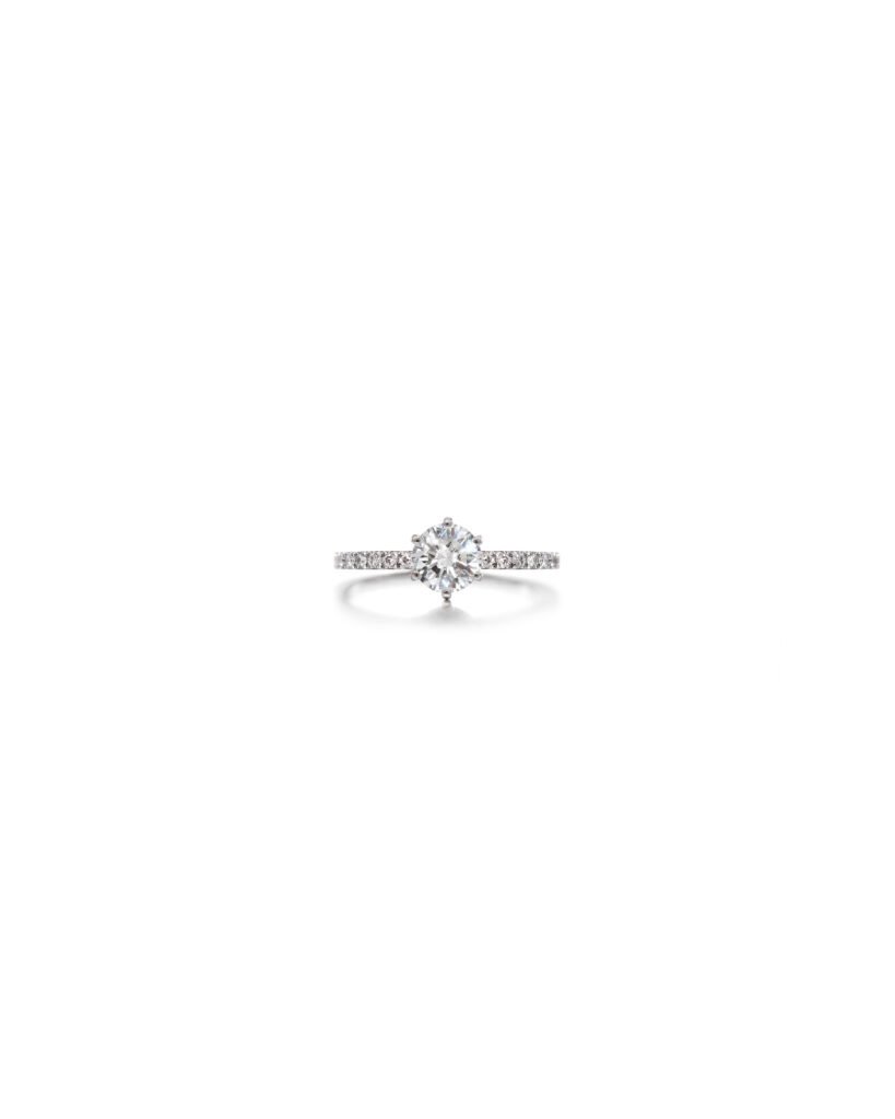 diamond solitaire ring with diamond band in platinum