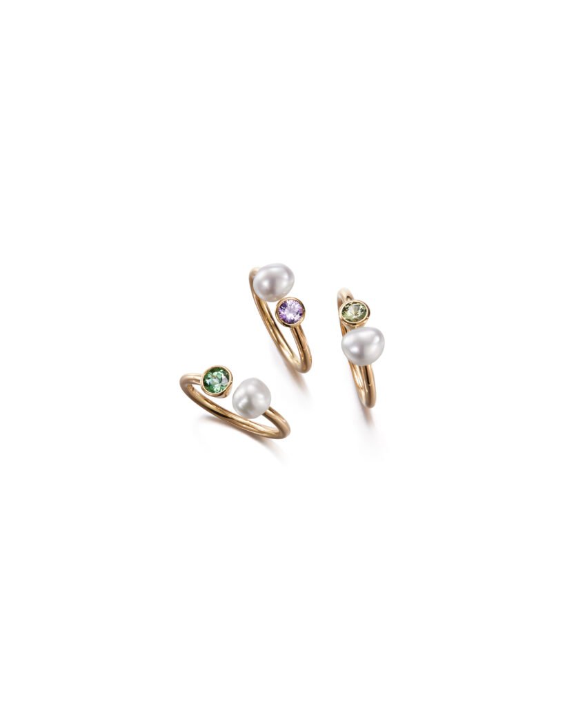 three yellow gold toi et moi ring with pearls and gemstones