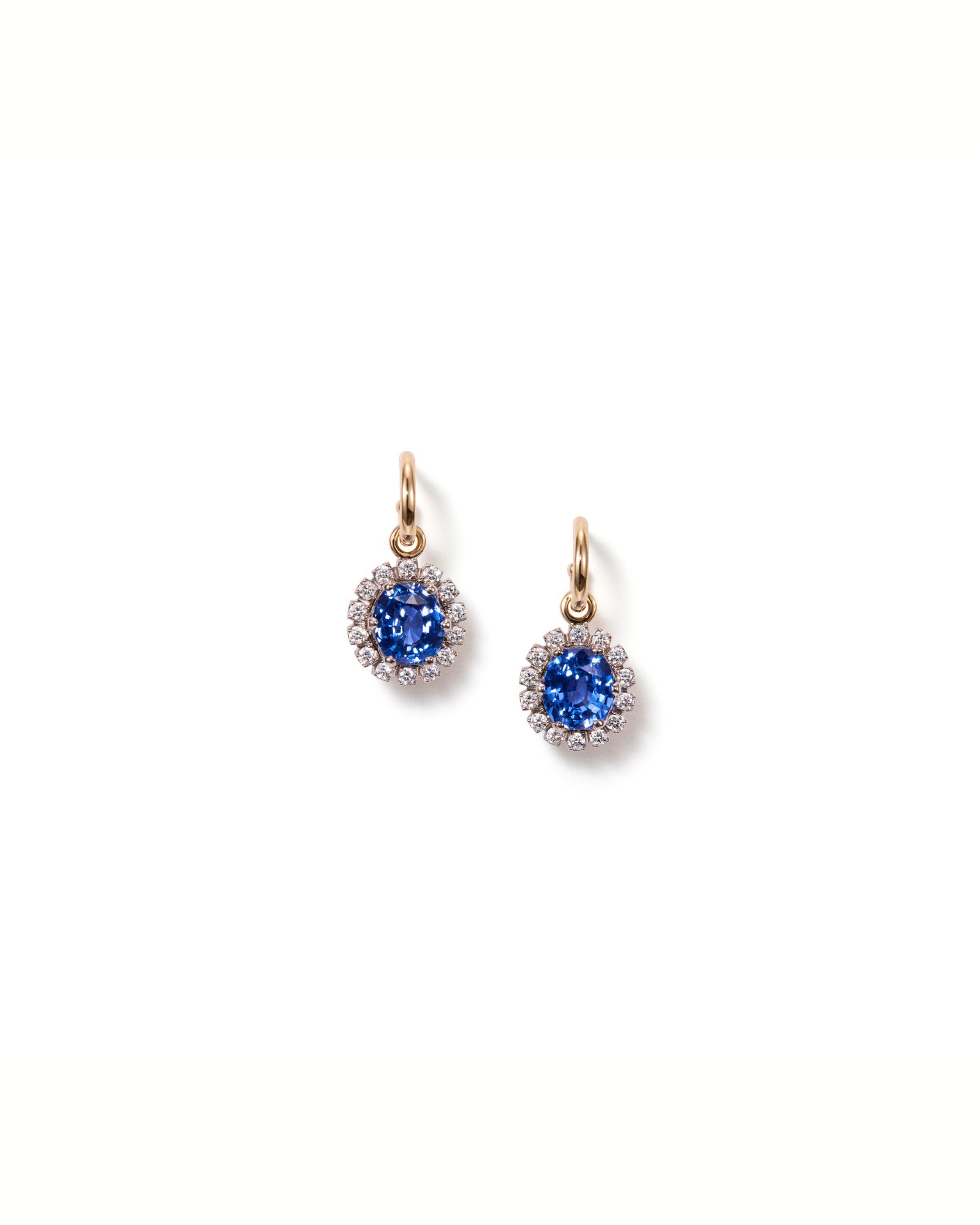 gold hoop earrings with dangling blue sapphires and diamond halo