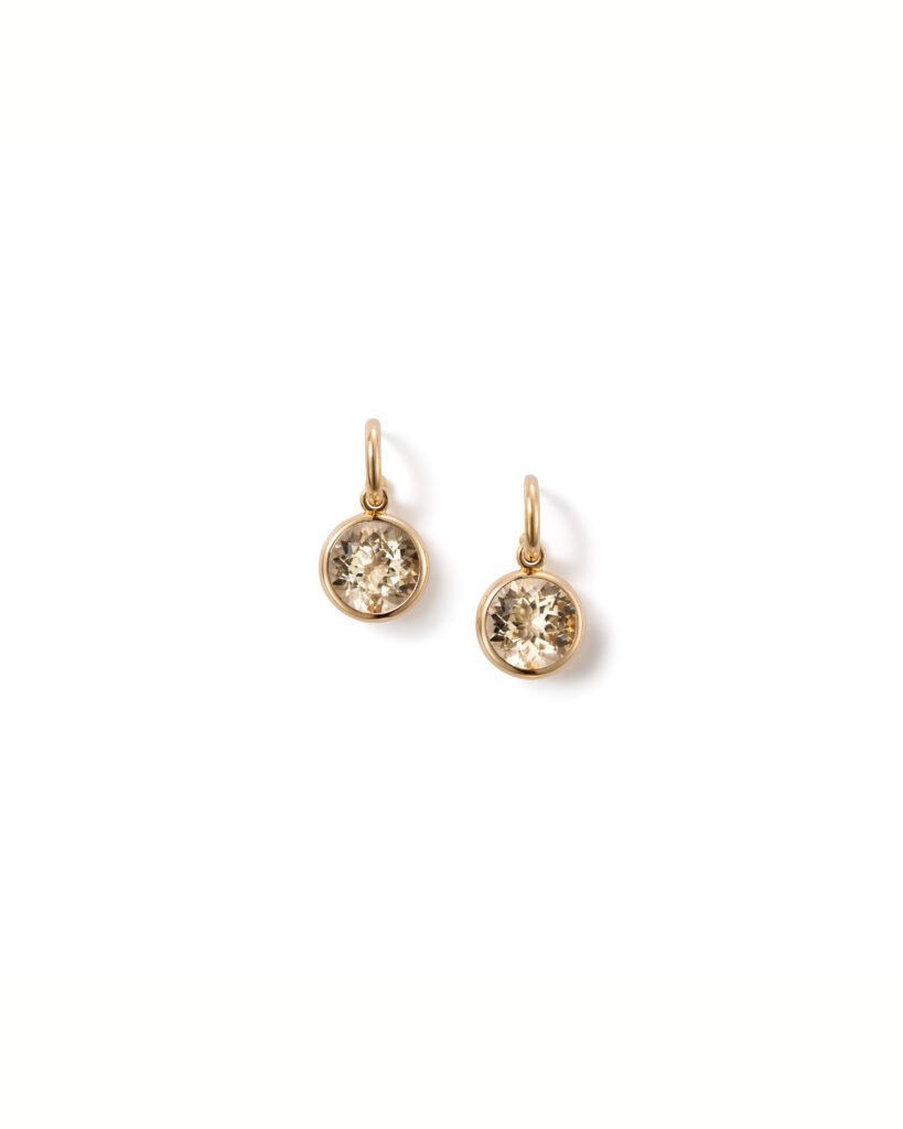 gold hoop earrings with dangling gemstones