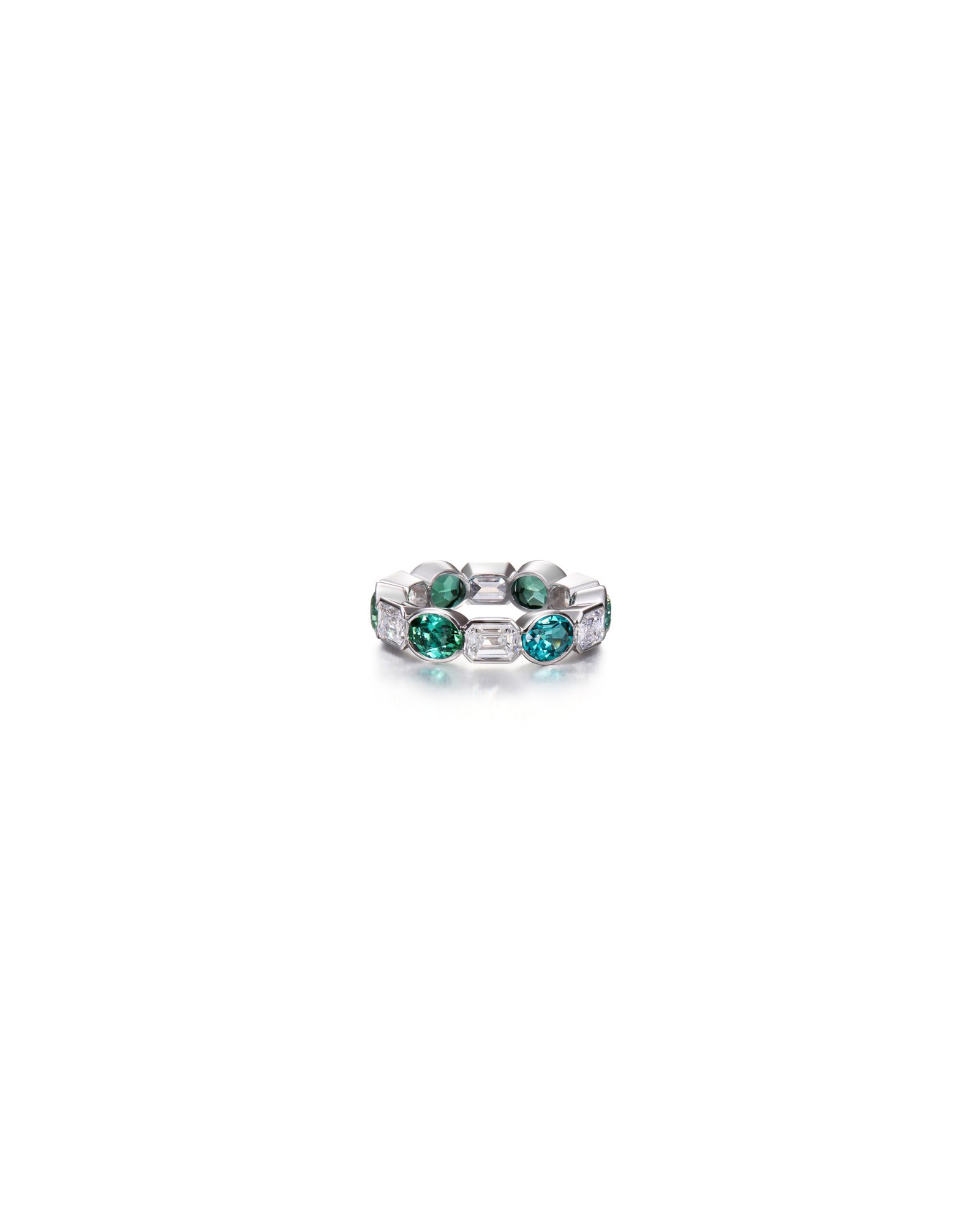 white gold diamond eternity ring with green tourmalines