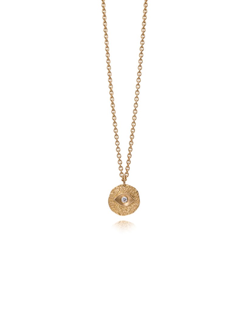 gold coin pendant with an eye
