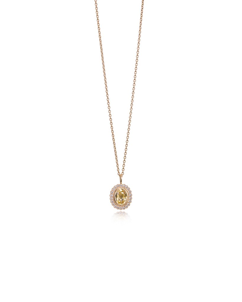 sapphire pendant with diamond halo in gold