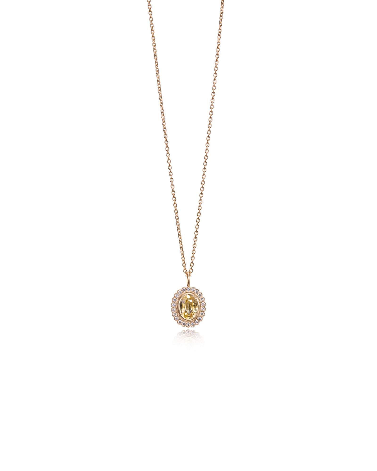 sapphire pendant with diamond halo in gold
