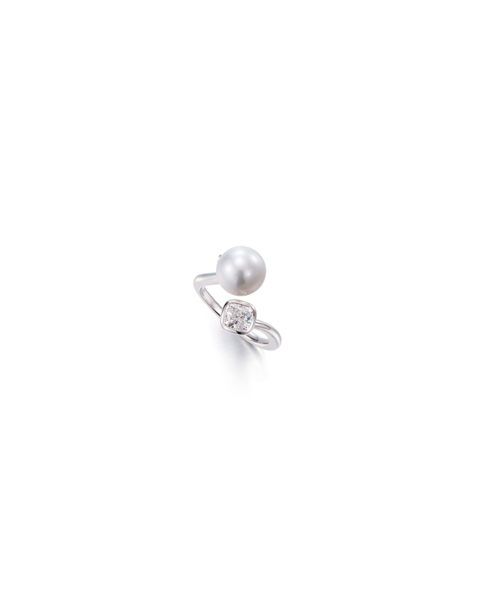 A Ballet ring with a south sea pearl and a diamond in white gold