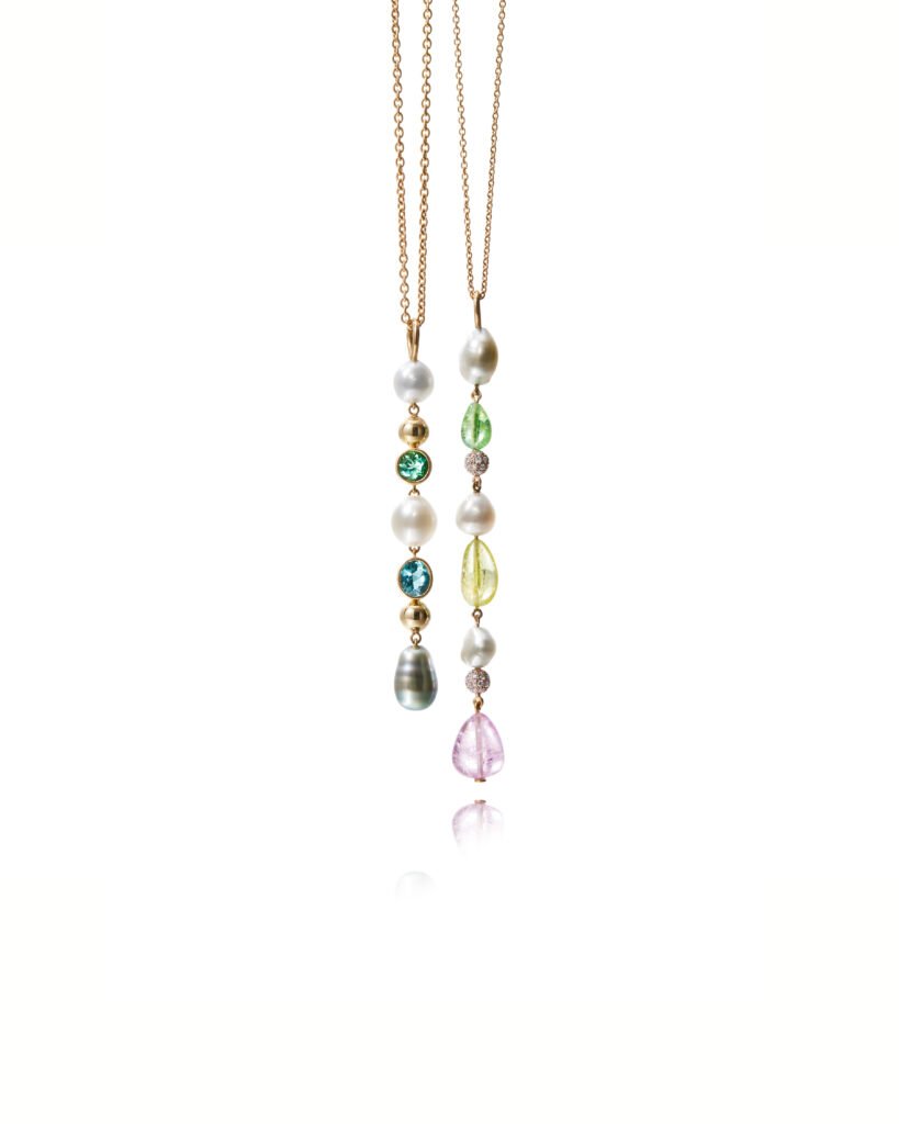 pendants with pearls and gemstones in gold chain